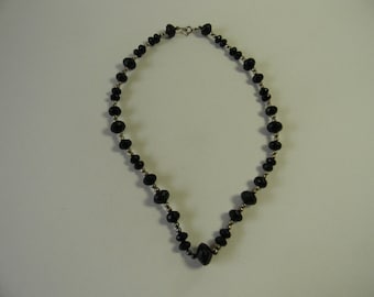 Black Faceted Glass bead, silver clad bead, one strand necklace, as is.