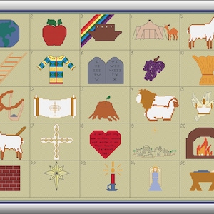 May include: A framed cross-stitch sampler with a grid of 25 squares, each depicting a different biblical image. The images include an apple, a rainbow, a ladder, a dove, a heart, and a manger. The color palette is primarily earth tones.