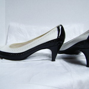 black and white wing tip heels