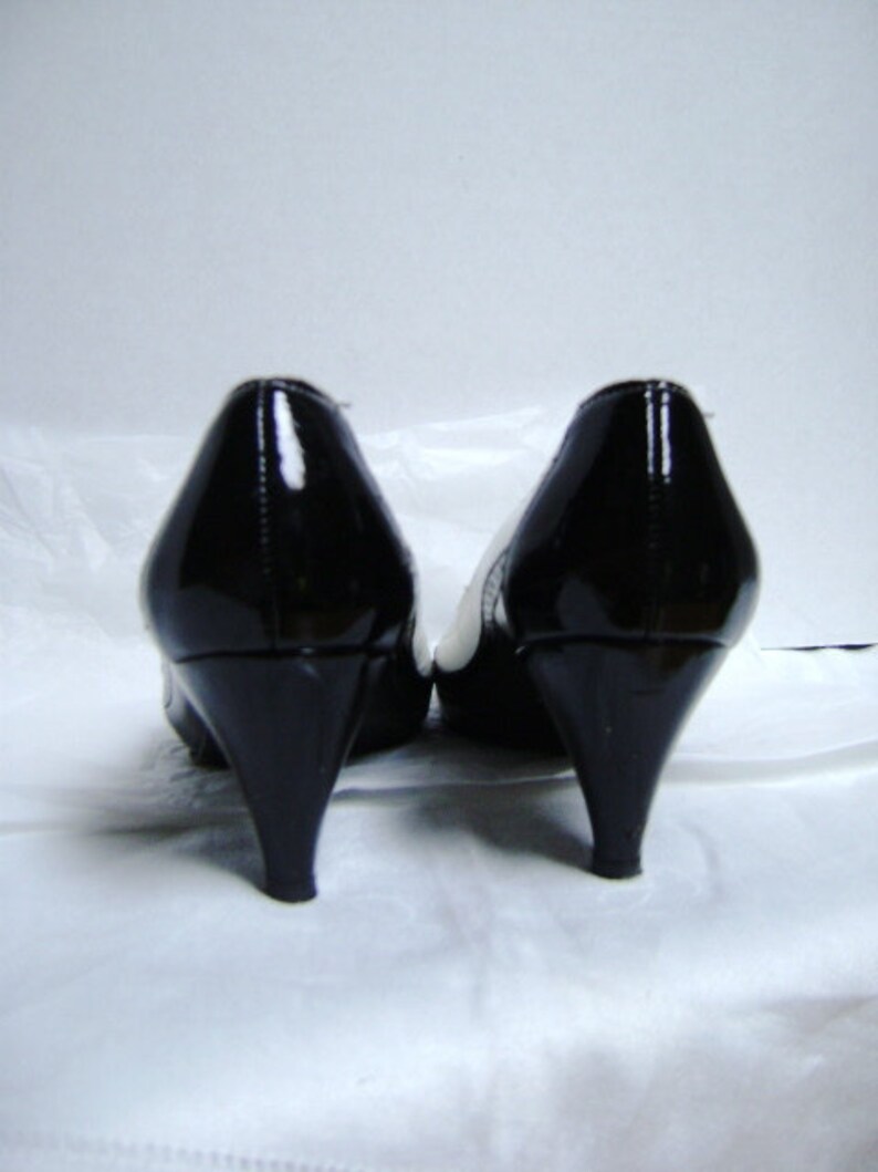 black and white wing tip heels