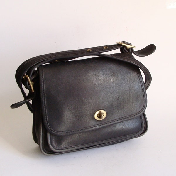 Vtg Black Leather Coach Purse. brass buckle. shoulder bag.