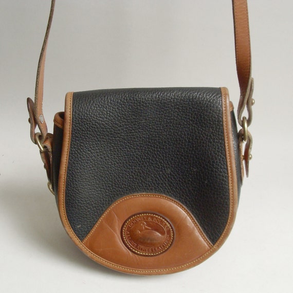 Items similar to Dooney and Bourke bag / black leather Dooney and ...