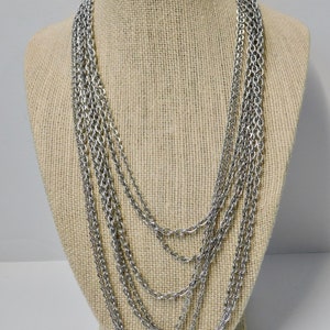 1972 AVON  Silver tone Multi Strands Chain Necklace and Bracelet