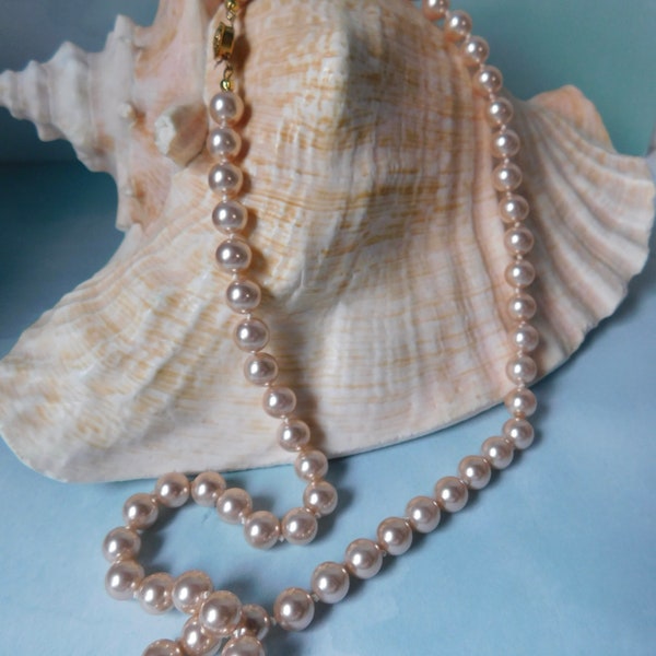 Hand knotted  Glass Faux Pearls Necklace. Pale Pink Color with Gold-tone Metal Closure.