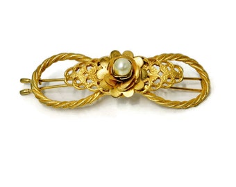 Beautiful Vintage Gold Tone with  Faux Pearl Hair Clip. Bow shaped with Rose and Pearl.