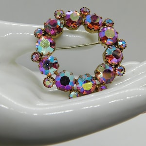 Vintage Gold-tone with Pink Aurora Borealis Rhinestones Circle Brooch/Pin.