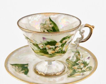 Vintage May Lily Of The valey  White Luster Teacup and Saucer. Footed cup.