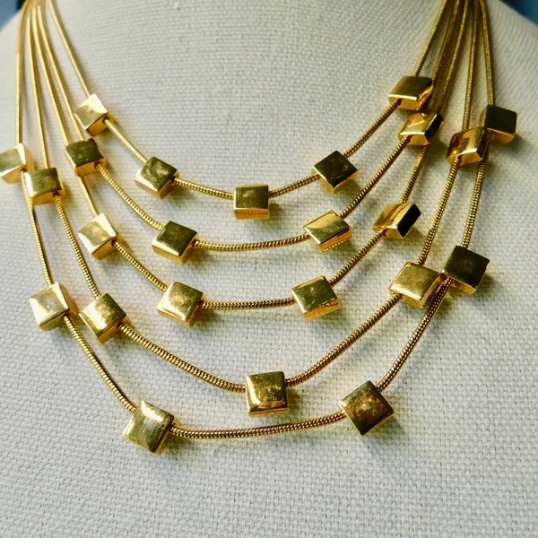 DVF Gold tone 5 Snake Chain Strands with Metal Squares Necklace. Diane Von Furstenberg Necklace.