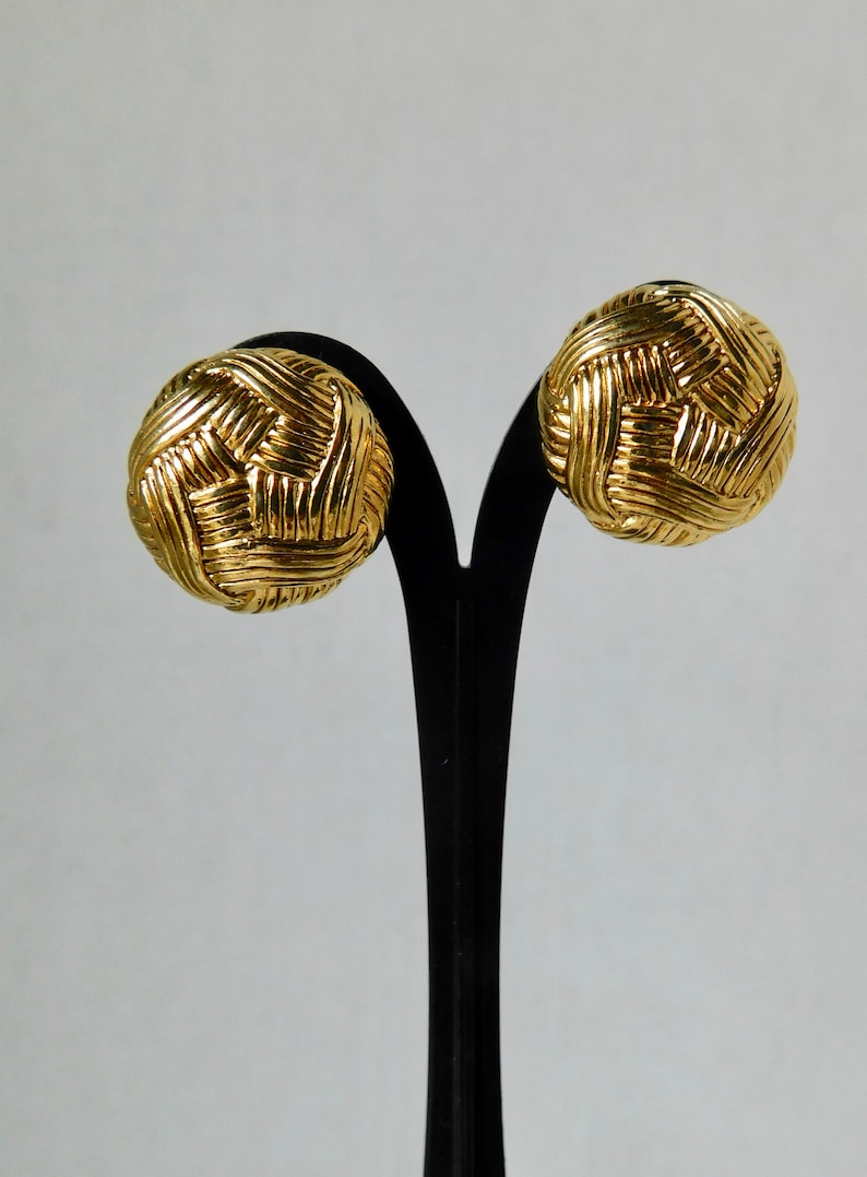 Vintage Oscar De La Renta Gold tone Clip on Earrings.