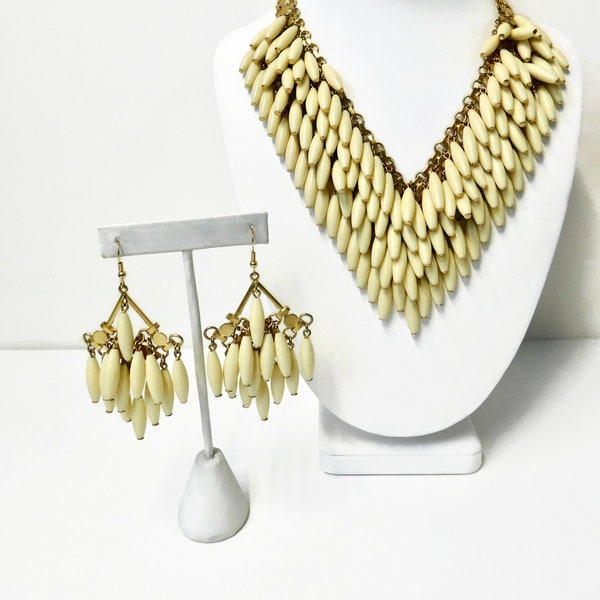 Vintage Tammey Jewels Gold and Cream Lucite Layered Necklace and Earrings.