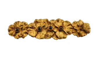Broche florale dorée antique avec strass couleur topaze