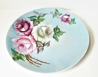 1960s Hand Painted Pink and White Roses 10inches Plate. Made in Germany. Artist signed and dated. 10 inches plate