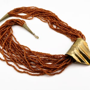 17 Strands Terra Cotta Color  Glass Seed Beads Necklace. with Brass Slide Pendant.