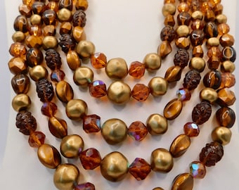 Collier ras de cou LAGUNA vintage 5 brins dans les tons ambre, marron et or.
