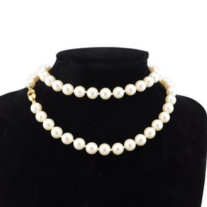 Vintage MONET Single Strand  Knotted Glass Faux Pearls Necklace. 24 inches.