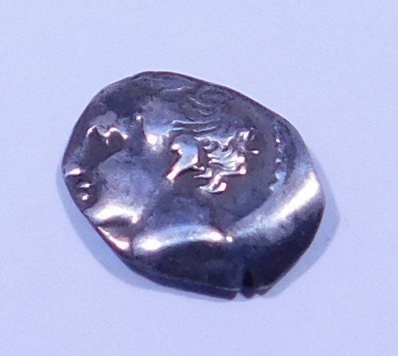 Authentic Ancient Greek Coin Of of Apollo Minted c. 400 B.C. image 0