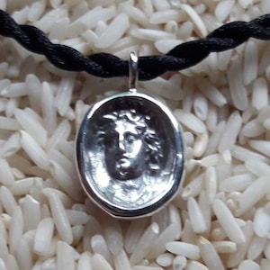 Apollo, God of music and arts pendant