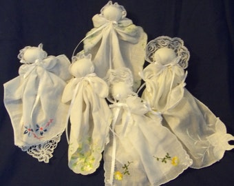 Vintage hankies made into hanky baby dolls have embroidered flowers, lace.  Handmade from heart of Ohio.  Pew / prayer / church / shower