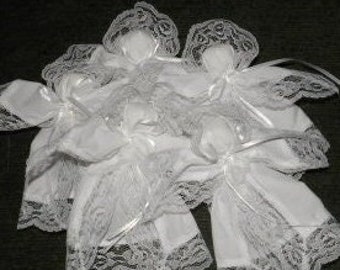 All white hanky dolls, pew dolls, church dolls or prayer dolls with lace bonnets are smaller but still handmade in Ohio