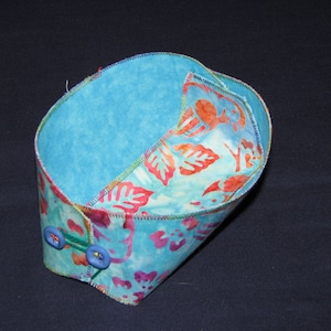 Travel bowl stores flat for trips then becomes a ring dish, jewelry holder, bathroom dish, wallet & change holder, business travel