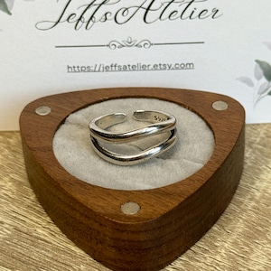 Justerbar twistring i 925 sterlingsilver: Moderna, eleganta smycken