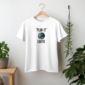 May include: White t-shirt with a black graphic of a globe and the text "PLAN-IT EARTH"