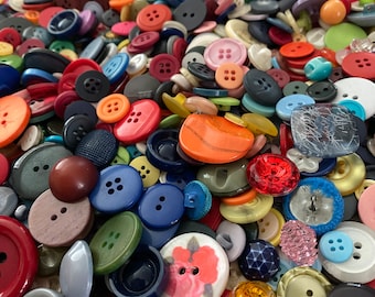 Huge lot of plastic multi colored buttons in all sizes