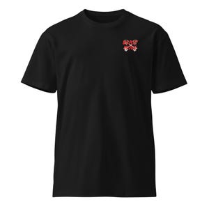 May include: Black t-shirt with a small red and white graphic on the upper left chest. The graphic features the words "BEAST MODE" with crossed axes. The shirt has short sleeves and a crew neck.