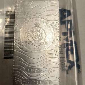 1 oz .9999 Fine Silver Star Wars Mandalorian Beskar Bar Niue 1 2022. It's tarnished due to moisture.