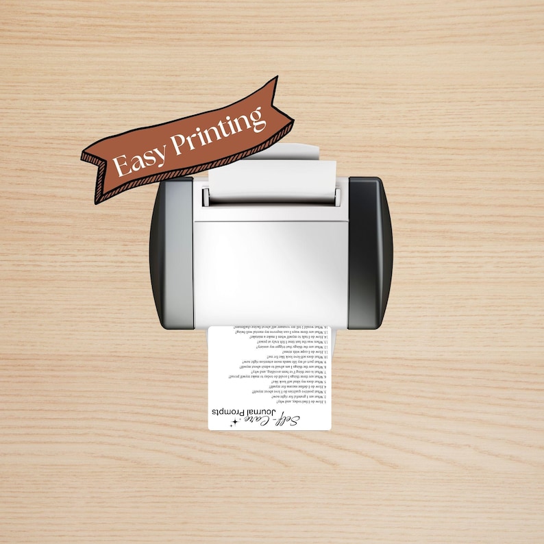 May include: A black and silver printer with a sheet of paper coming out of it. The paper has text that says "Self-Care Journal Prompts" and a list of prompts. A red and white banner above the printer says "Easy Printing".