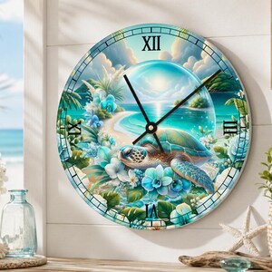 May include: A round wall clock featuring a sea turtle swimming near a tropical beach inside a glass sphere. The clock face displays Roman numerals, vibrant blue and green floral accents, and a sunlit ocean scene with black hour and minute hands.
