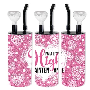 May include: Pink glitter glass water pipe with a black mouthpiece and a removable bowl. The pipe has a white heart with the text "I'm a little high, I ain't no maintenence" in pink lettering.