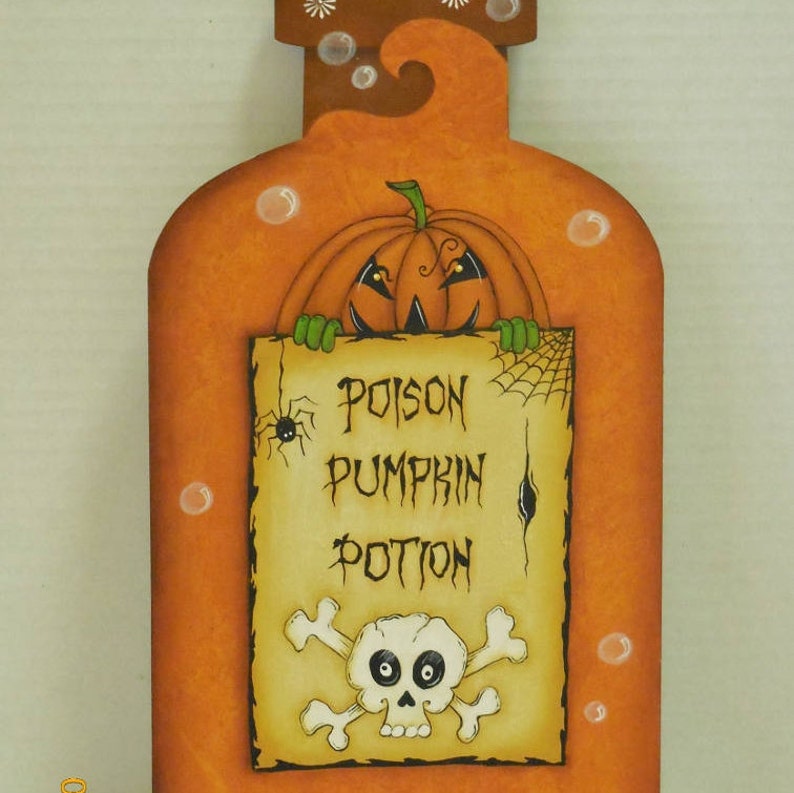 May include: Orange wooden bottle with a grinning pumpkin face peeking out from behind a sign that reads "Poison Pumpkin Potion" with a skull and crossbones.