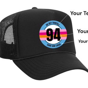 May include: Black trucker hat with a colourful circular patch that says "Oh Hey Thirties Cabo San Lucas 94".