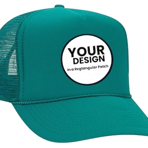May include: A teal trucker hat with a white circle patch that says "YOUR DESIGN In a Rectangular Patch".