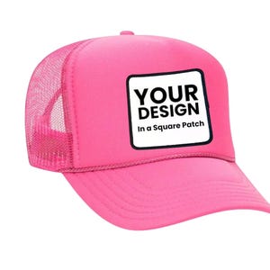 May include: Pink trucker hat with a black square patch that says "YOUR DESIGN In a Square Patch".
