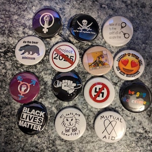 1.5" button pins (political, feminist, LGBT)