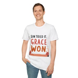 Grace Won Unisex T-Shirt - Inspirational Faith Tee, Cotton Shirt for Everyday Wear, Perfect for Church, Gift for Believers Jesus Loves You