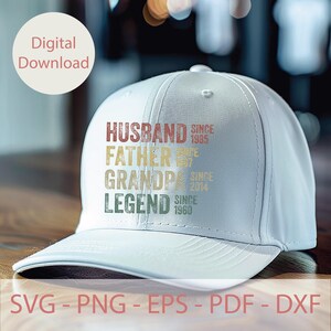 May include: A light gray baseball cap with the words "HUSBAND, FATHER, GRANDPA, LEGEND" in a vintage font. The cap also includes the years "SINCE 1985, 1987, 2014, 1960". A digital download graphic.
