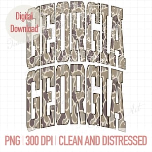 May include: A digital graphic design featuring the word GEORGIA stacked twice in a bold, block-style font. The letters have a distressed, weathered texture and are filled with a brown, tan, and grey camouflage pattern against a white grid.