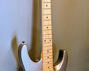 Guitarra eléctrica vintage Martin Stinger SSX Gold Flake/Champagne de los años 80 en excelentes condiciones