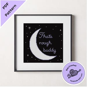 May include: A black and white cross-stitch pattern featuring a crescent moon and the text "That's rough buddy".