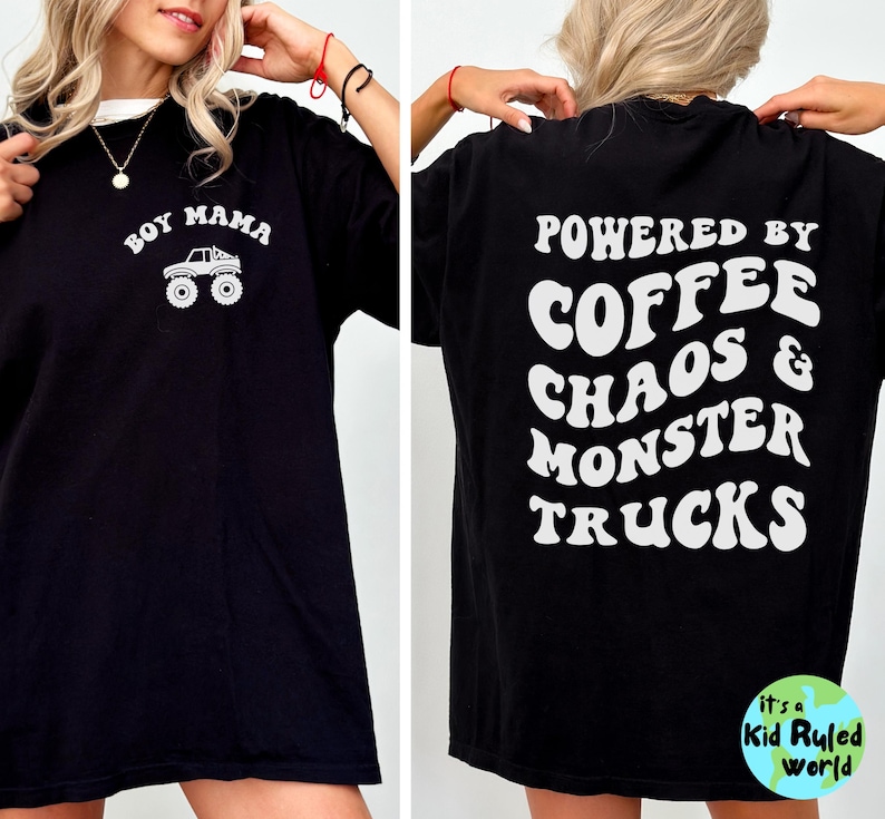 May include: Black t-shirt with white text and graphics. The front reads "Boy Mama" with a monster truck graphic. The back says "Powered by Coffee Chaos & Monster Trucks". A fun, casual tee.