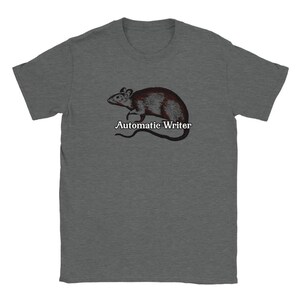 May include: A dark heather grey t-shirt with a graphic of a rat and the text "Automatic Writer".