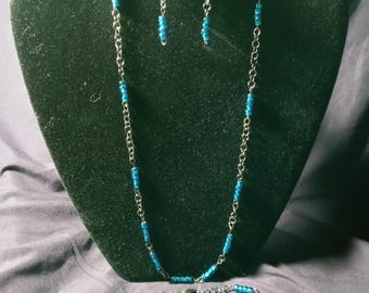 Conjunto de cuentas en tonos azules y bronce