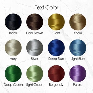 May include: A color chart titled Text Color featuring twelve circular swatches of thread in black, dark brown, gold, khaki, ivory, silver, deep blue, light blue, deep green, light green, burgundy, and purple, each labeled with its respective color name.