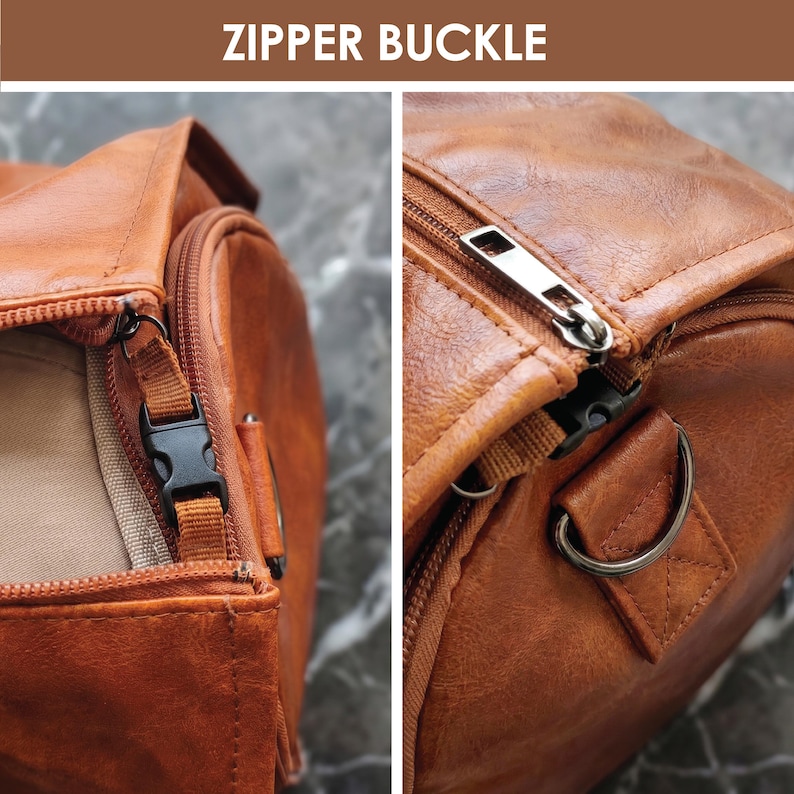 May include: A tan brown duffel bag featuring a zipper closure and a black plastic side-release buckle. The bag includes a metal D-ring attachment point and a silver-toned metal zipper pull. The text ZIPPER BUCKLE is displayed at the top.