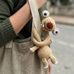 May include: A rustic wooden sign with the text "Welcome to our home" in white lettering. The sign has a distressed finish and a simple, inviting design, ideal for front door decor.