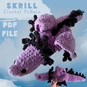 May include: A purple and black crochet dragon with the text "SKRILL Crochet Pattern PDF FILE". The dragon has large eyes and a textured, plush appearance. The wings and horns are black, contrasting with the purple body.