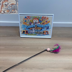 Interactive Cat Feather Toy with Bell – Long Handle Teaser Stick for Cats and Kittens